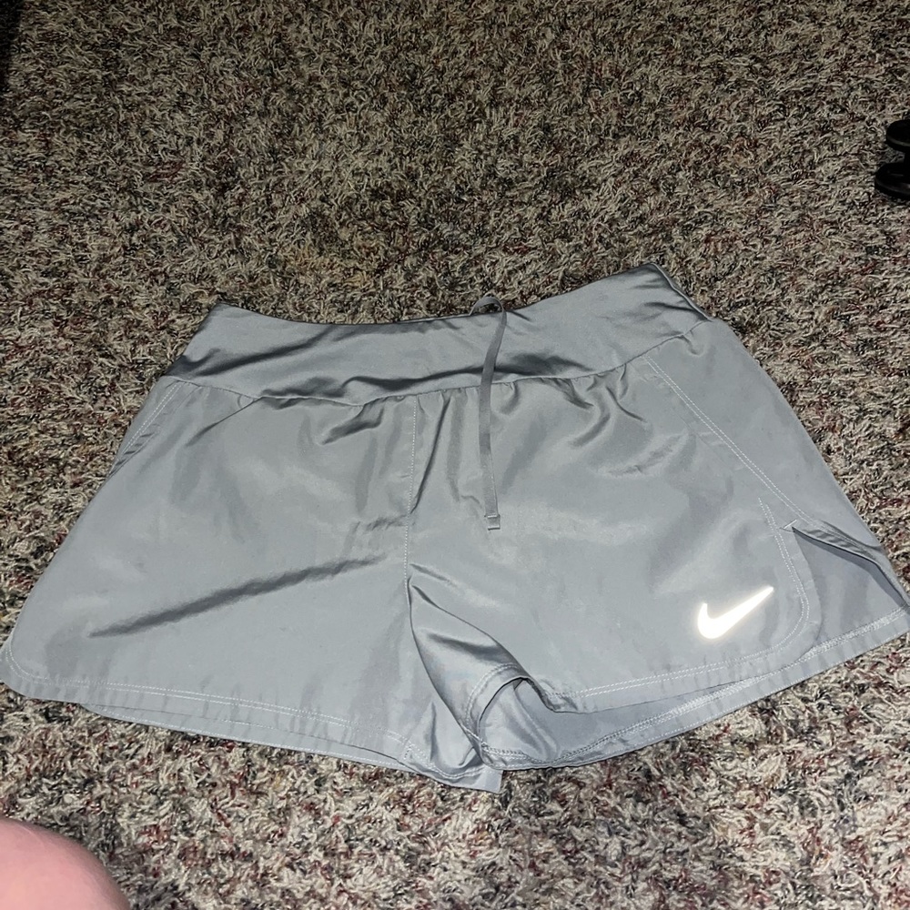 Nike grey athletic shorts. Never worn. Size: M